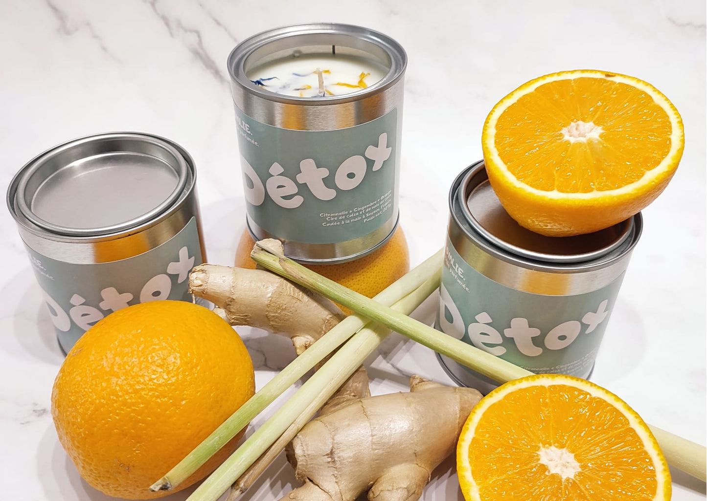 Bougie parfumée Détox à la cire 100% naturelle accompagné de citronnelle, gingembre et oranges.